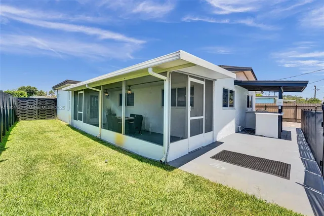 a view of swimming pool with seating space