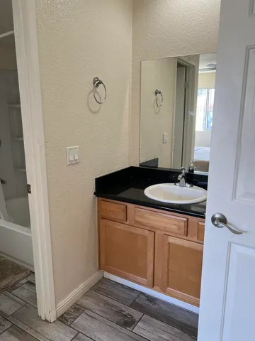 a view of a kitchen from the hallway