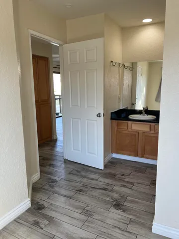 a view of a backyard with a fountain