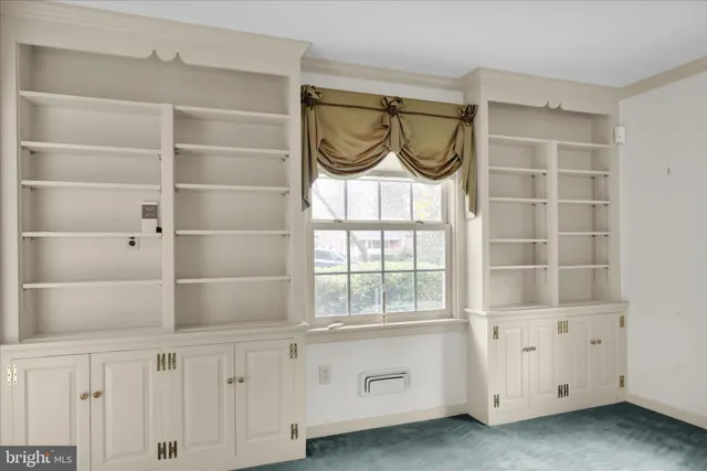 a living room with a fireplace