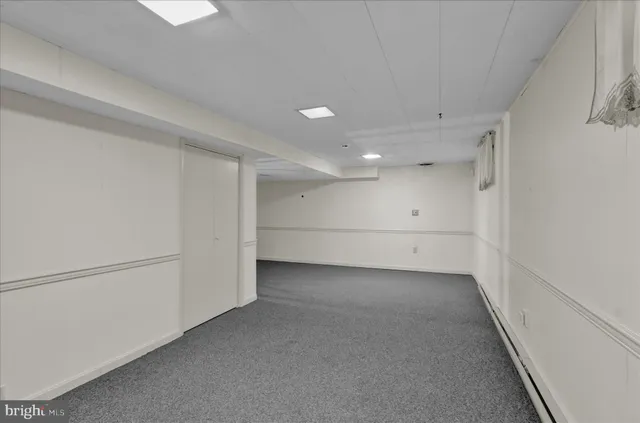 a bathroom with a shower and a tub