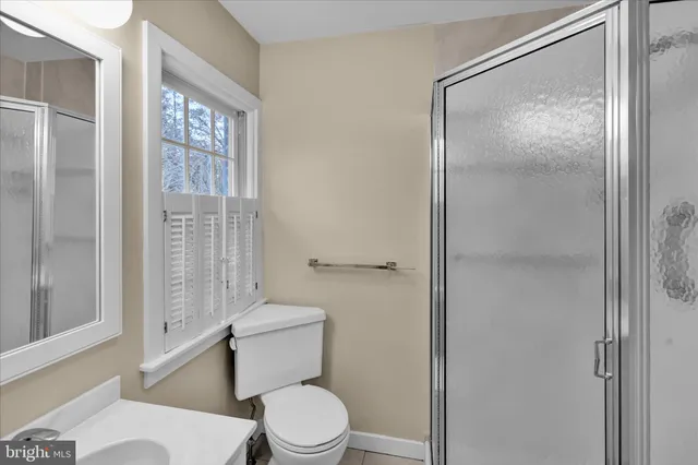 a living room with furniture and windows