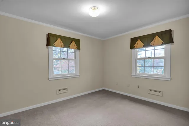 a picture of a room with a white wall and white walls