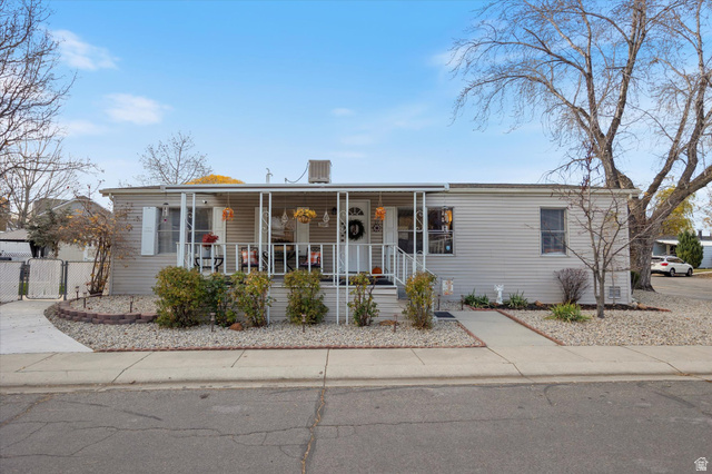 11228 South Jordan View Drive, Unit 27 Sandy, UT 84070 - Photo 1 of 1 View of front facade featuring a porch
