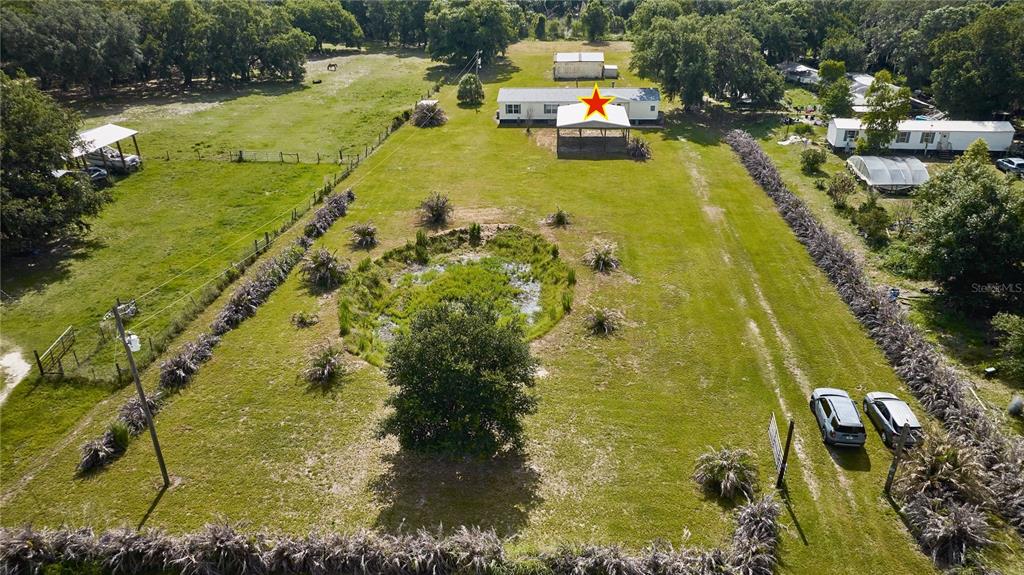 2701 Murphy Road Ona, FL 33865 - Photo 39 of 41 a swimming pool with some trees in the background