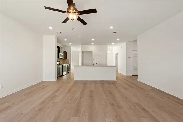 an empty room with closet area