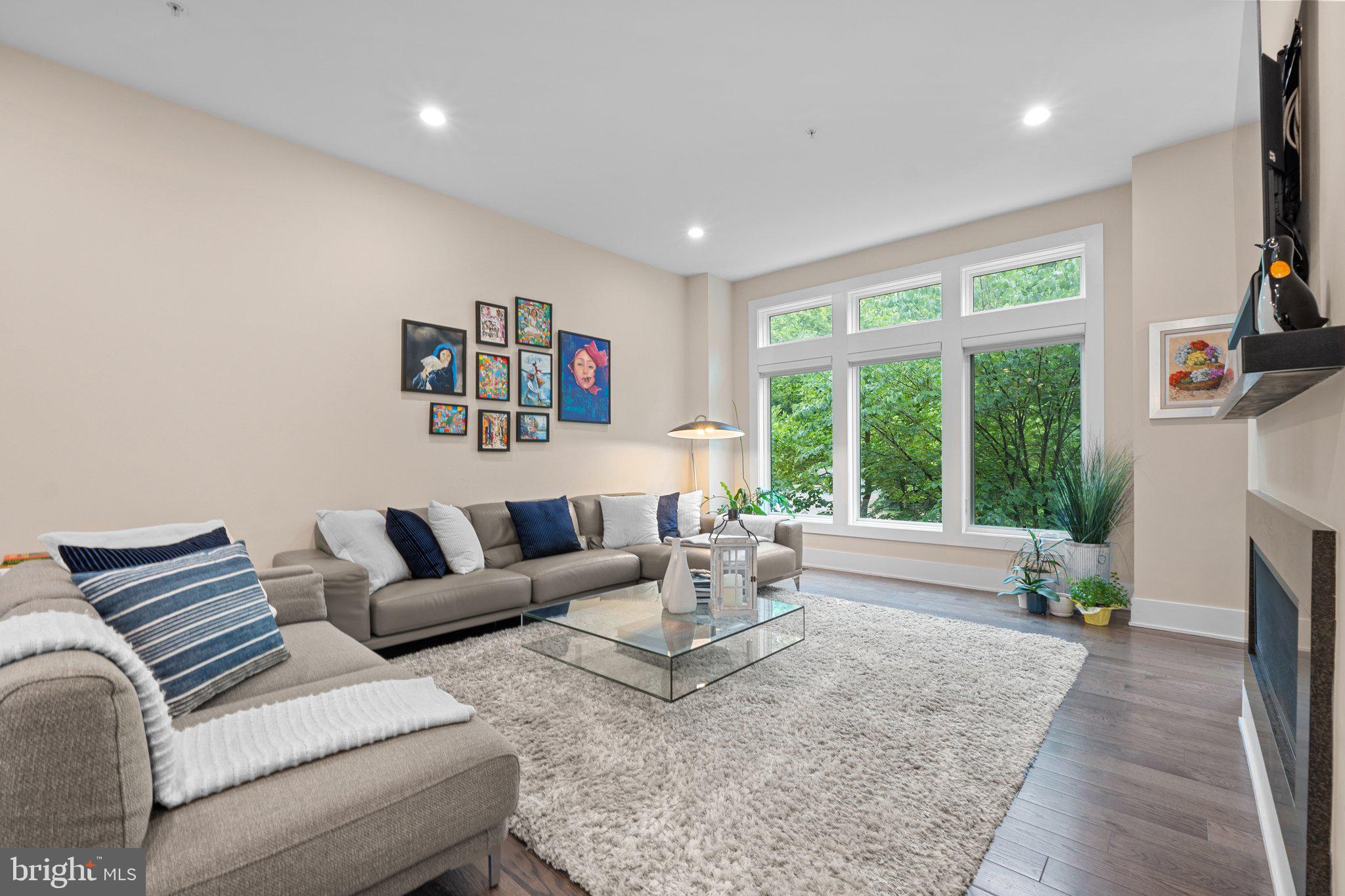 5307 Merriam Street Bethesda, MD 20814 - Photo 12 of 32 a living room with furniture and a large window