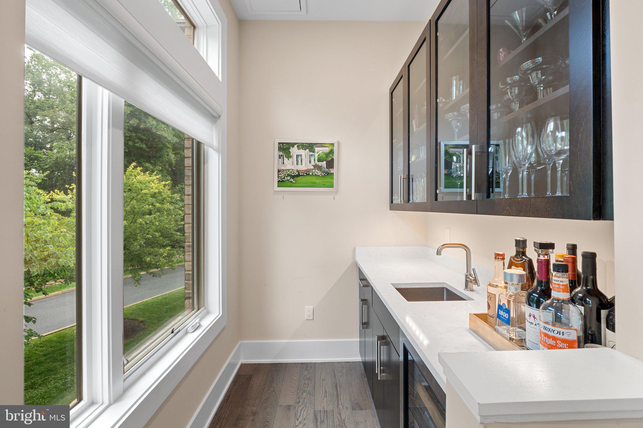 5307 Merriam Street Bethesda, MD 20814 - Photo 16 of 32 a view of a sink and a stove top oven