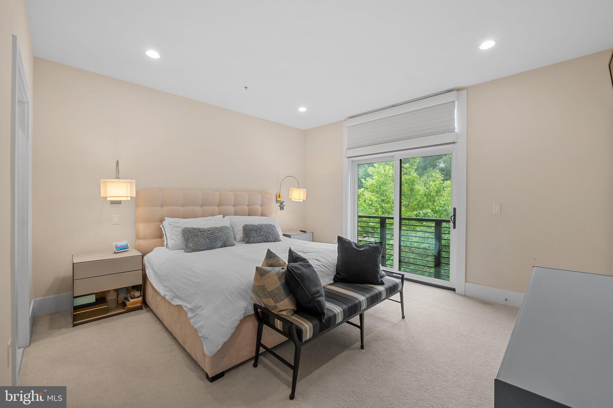 5307 Merriam Street Bethesda, MD 20814 - Photo 18 of 32 a bedroom with furniture and a large window