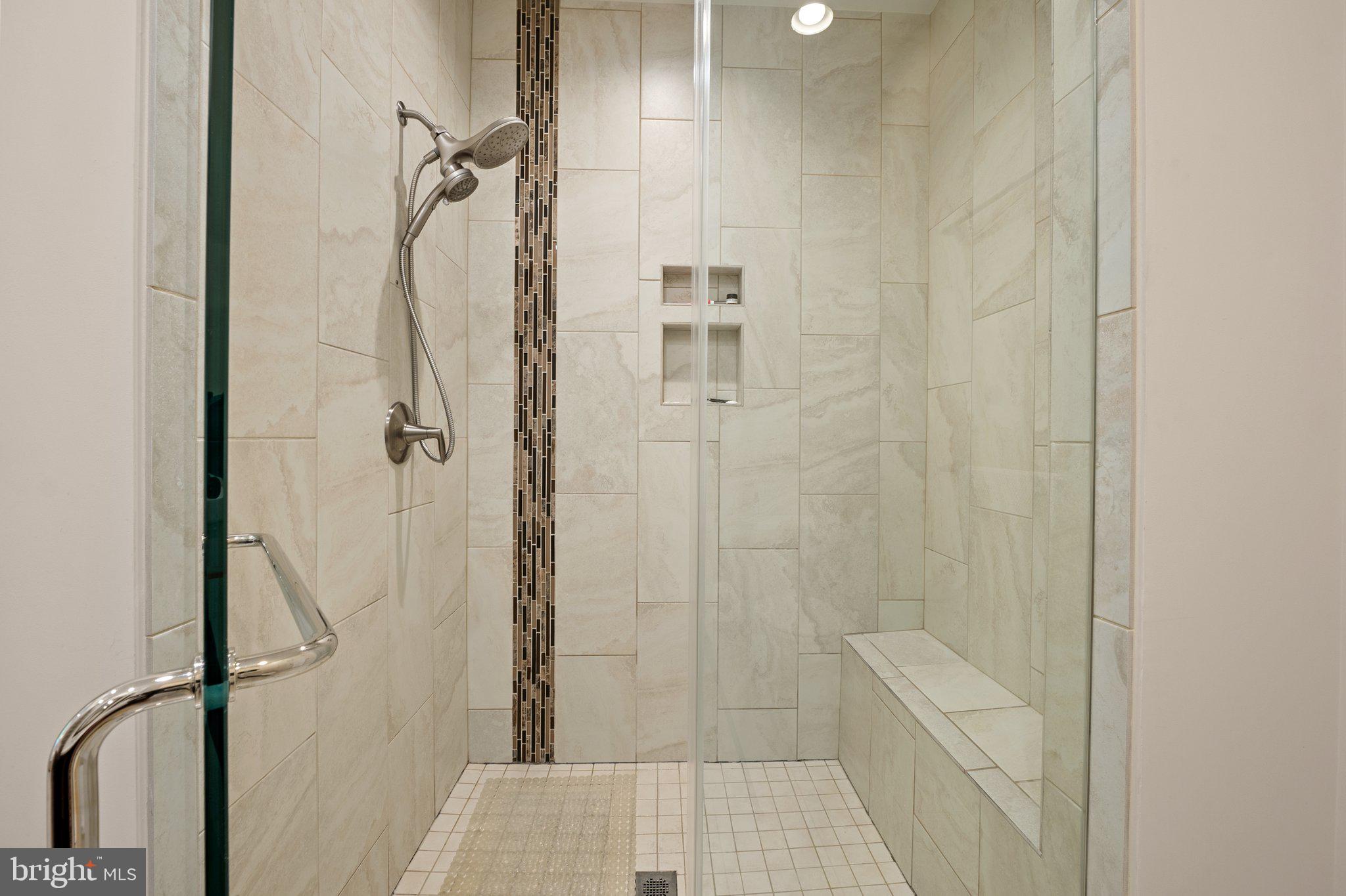 5307 Merriam Street Bethesda, MD 20814 - Photo 21 of 32 a bathroom with a shower