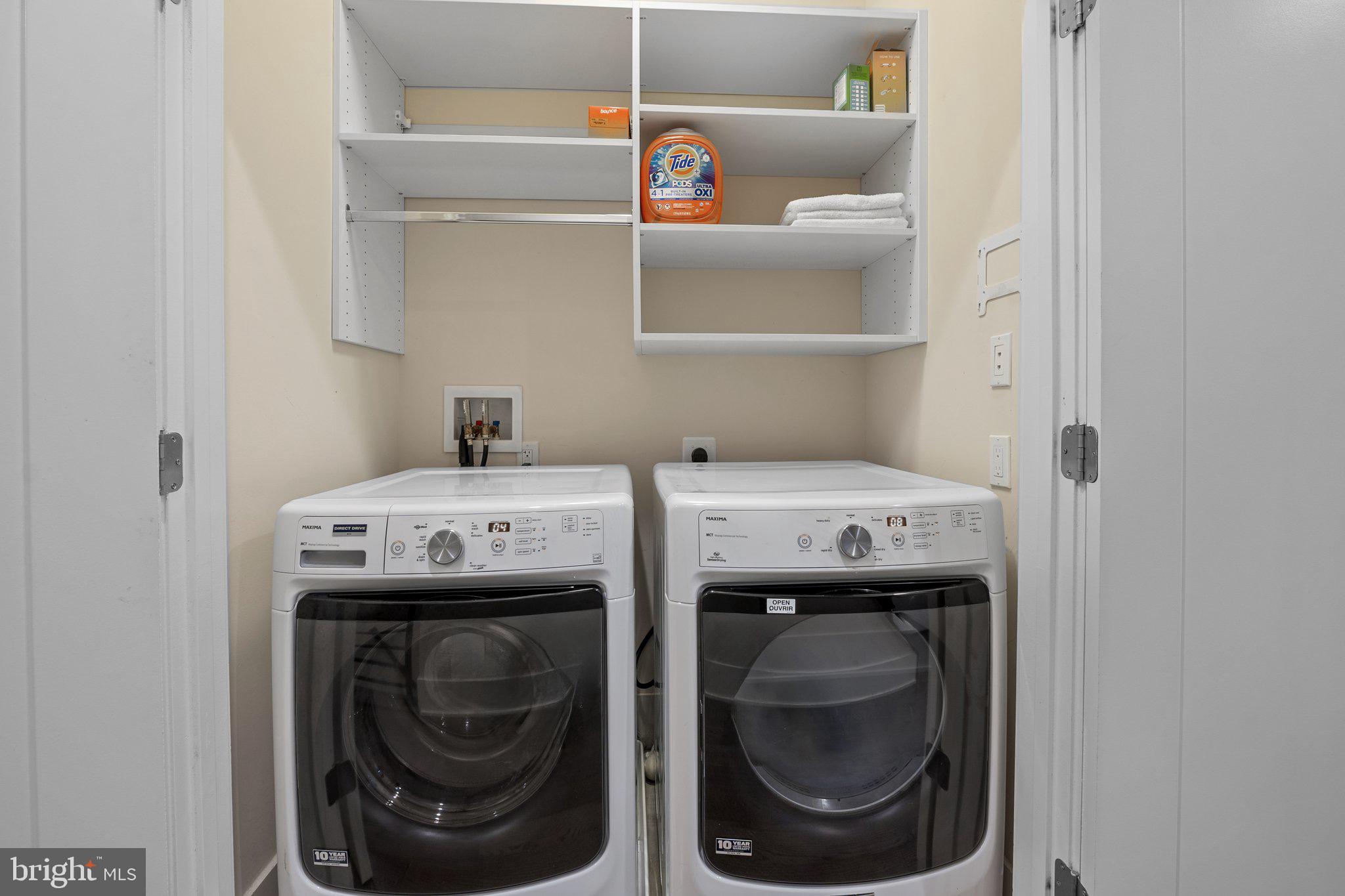 5307 Merriam Street Bethesda, MD 20814 - Photo 26 of 32 a utility room with dryer and washer