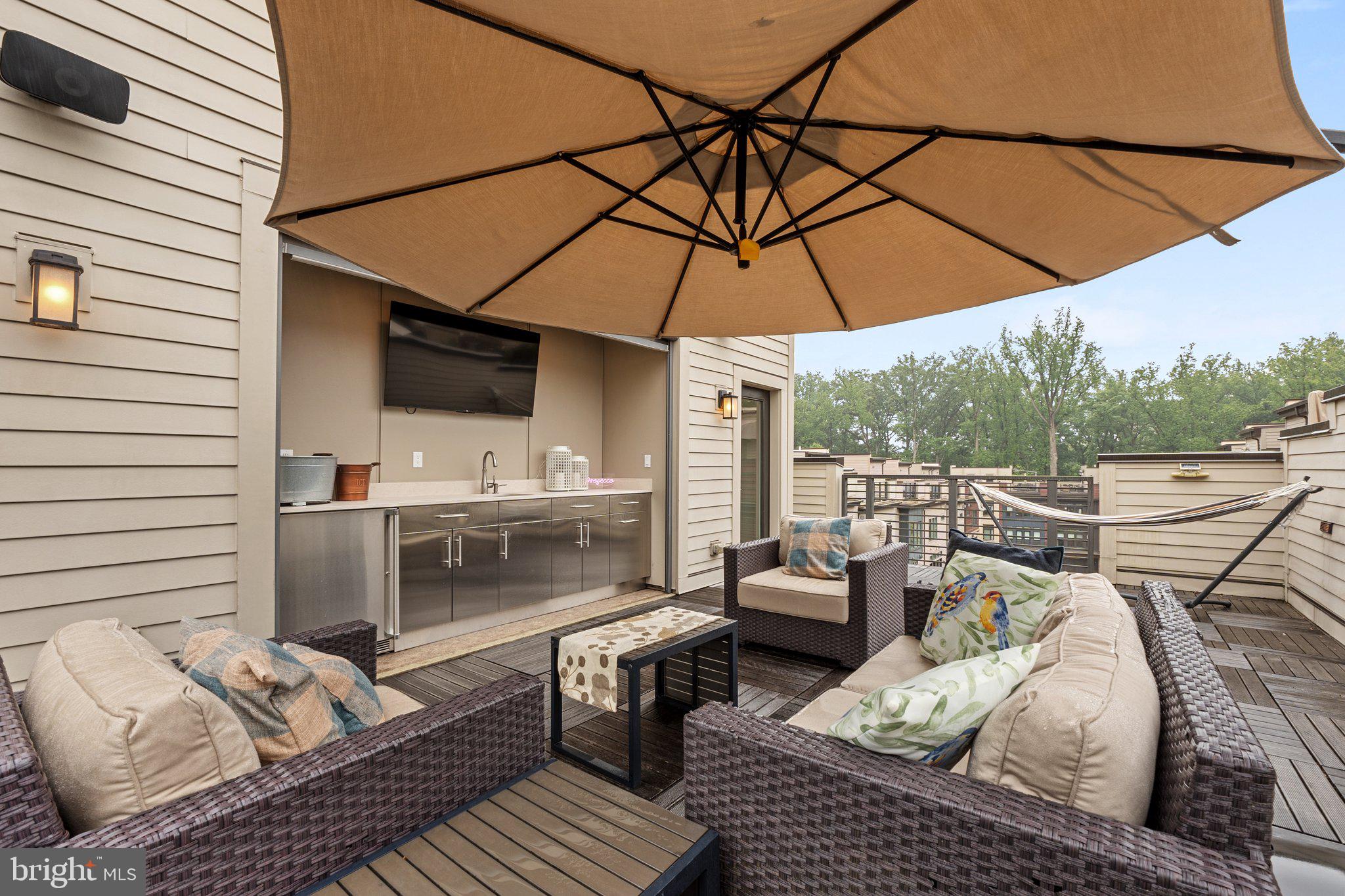 5307 Merriam Street Bethesda, MD 20814 - Photo 31 of 32 a terrace of a house with outdoor seating