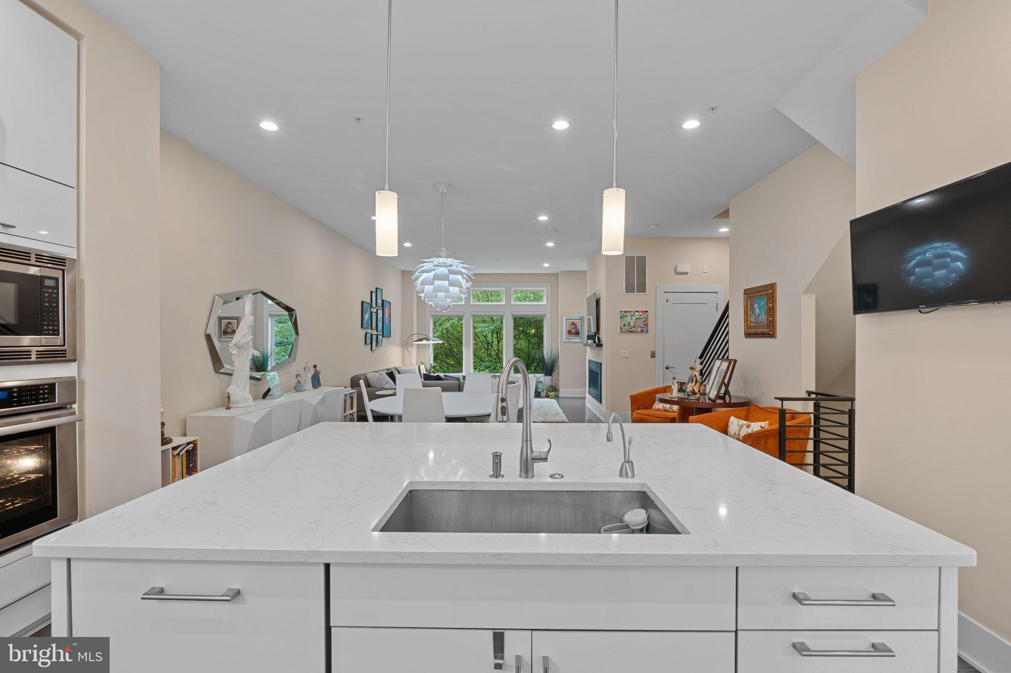 5307 Merriam Street Bethesda, MD 20814 - Photo 7 of 32 a view of living room with furniture and flat screen tv