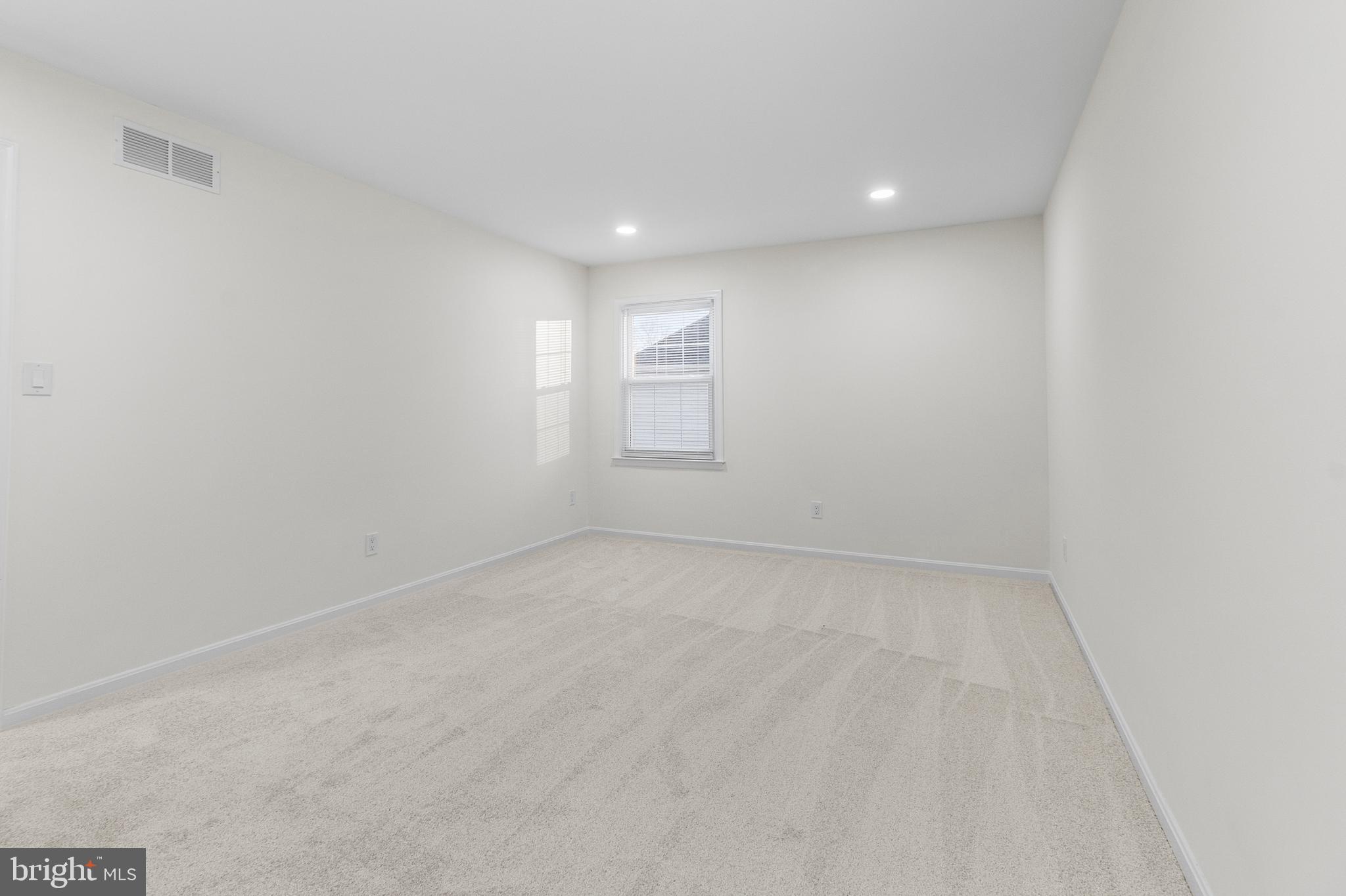 210 West Silver Fox Road Newark, DE 19702 - Photo 18 of 43 a view of an empty room and a window