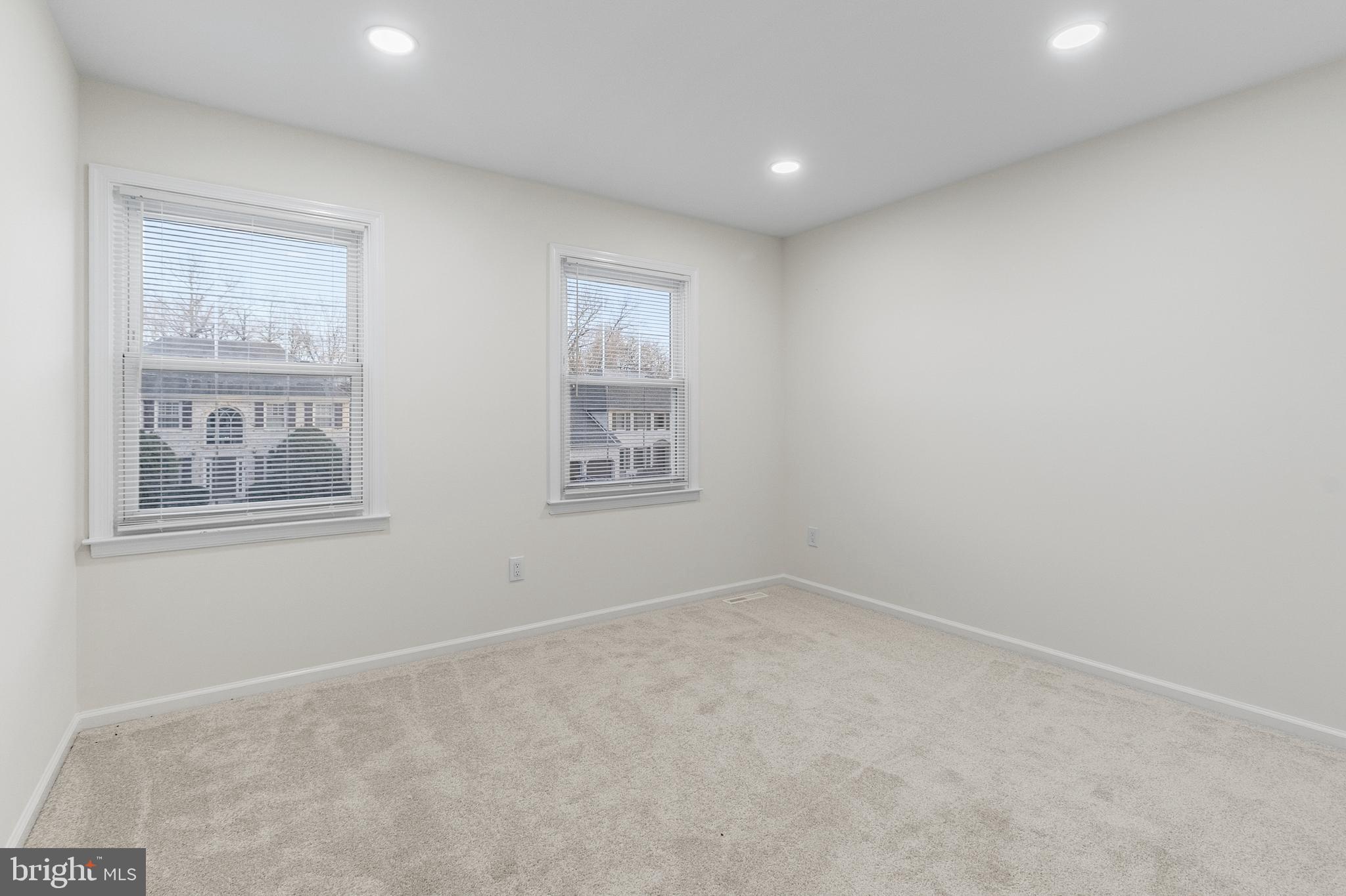 210 West Silver Fox Road Newark, DE 19702 - Photo 23 of 43 an empty room with windows