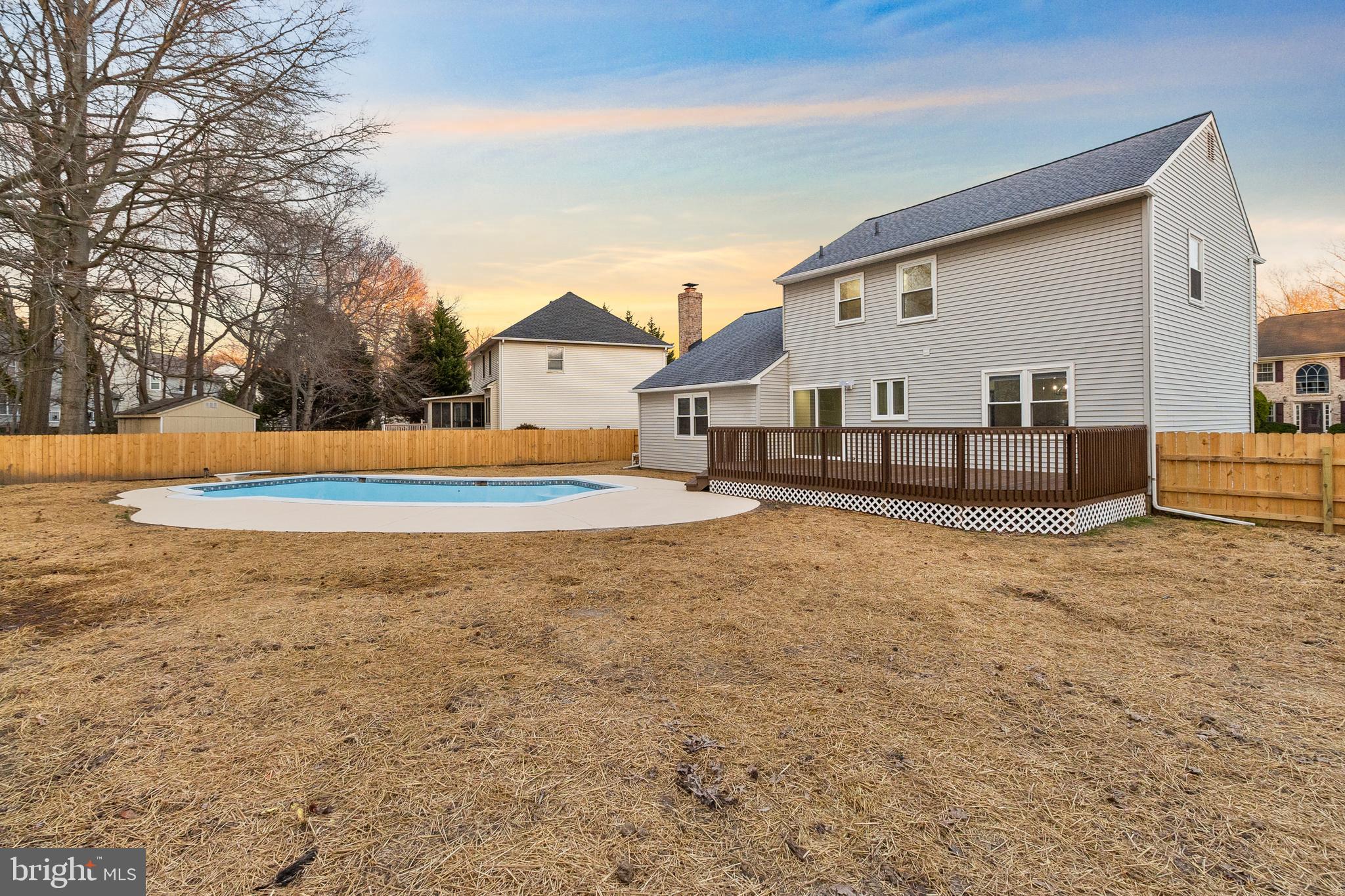 210 West Silver Fox Road Newark, DE 19702 - Photo 34 of 43 a view of a house with backyard and trees in the background