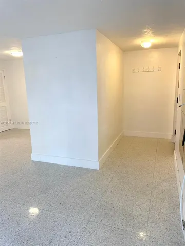 an empty room with a natural light