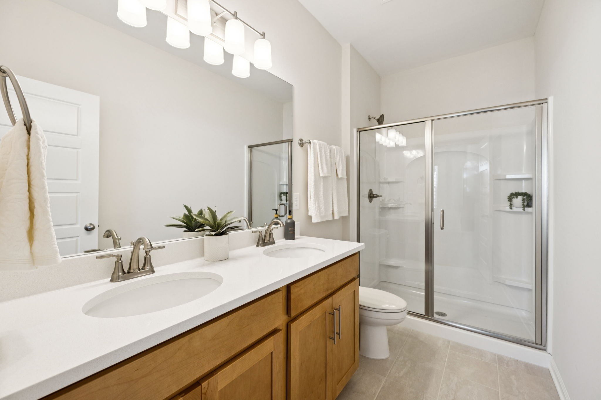 349 Carver Connection Lebanon, TN 37087 - Photo 16 of 24 a bathroom with a double vanity sink mirror double and shower