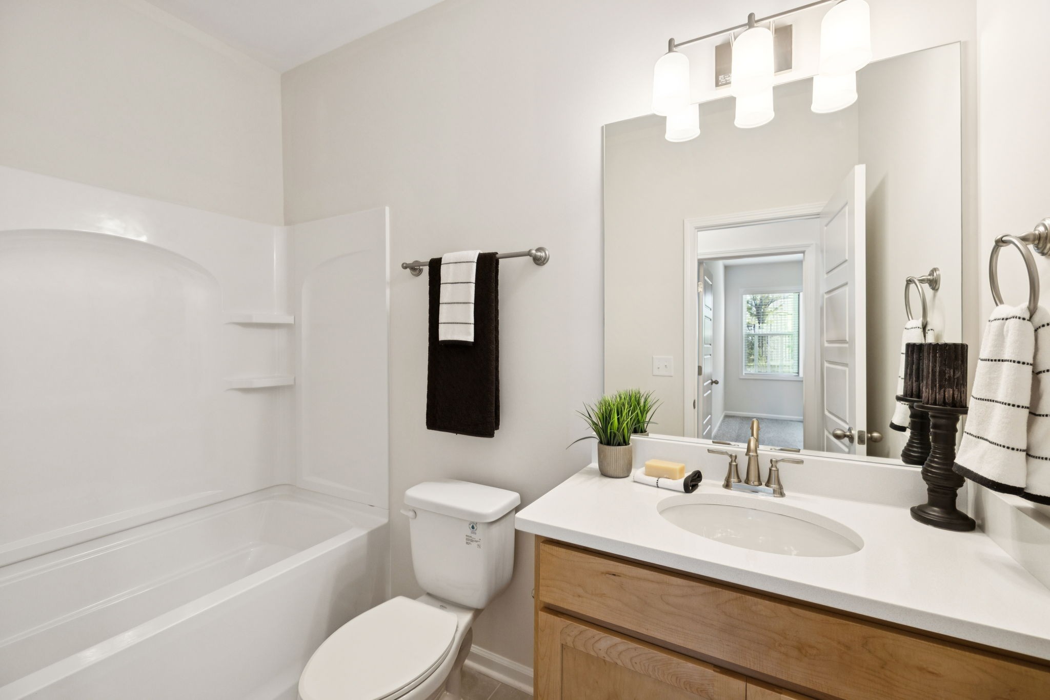 349 Carver Connection Lebanon, TN 37087 - Photo 18 of 24 a bathroom with a sink vanity granite toilet tub and shower