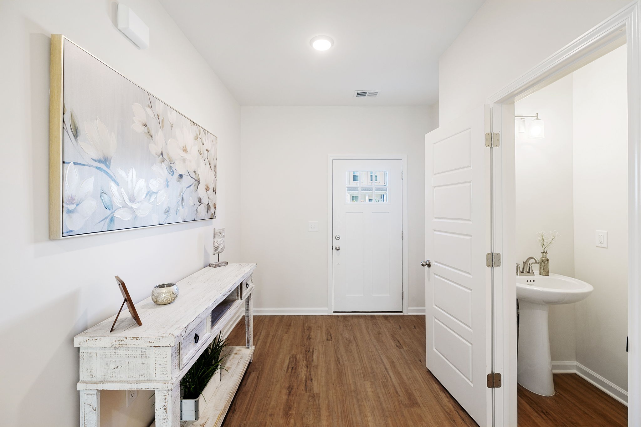 349 Carver Connection Lebanon, TN 37087 - Photo 4 of 24 workspace with wooden floor and cabinet