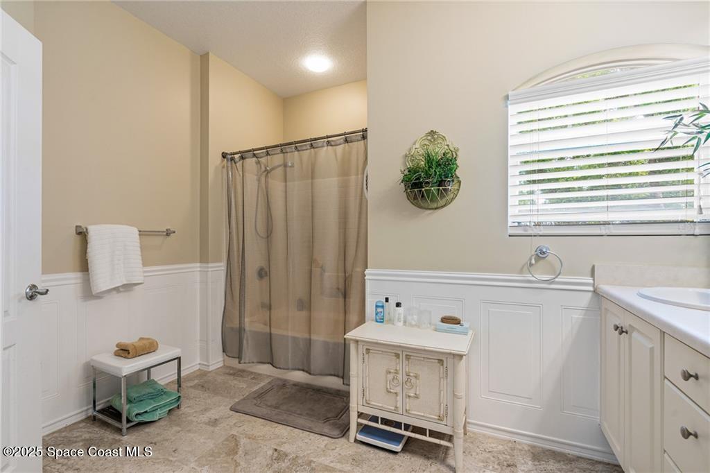 Undisclosed Address Vero Beach, FL 32967 - Photo 16 of 34 a bathroom with a sink and a window