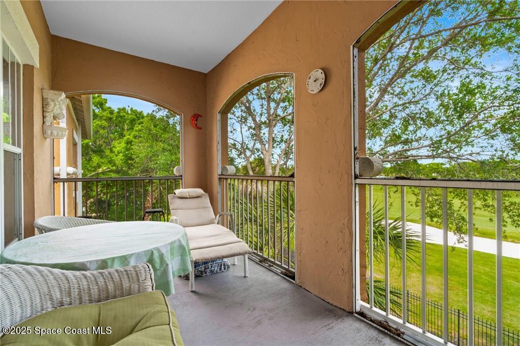 Undisclosed Address Vero Beach, FL 32967 - Photo 3 of 34 a bedroom with large window and yard