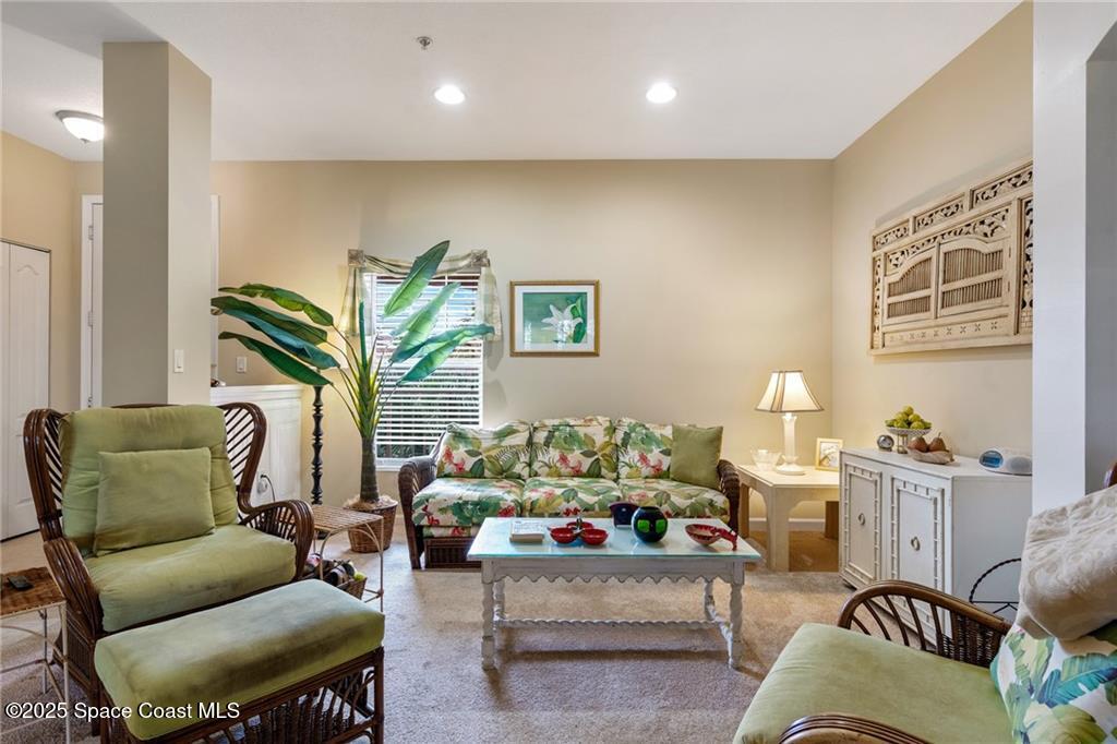 Undisclosed Address Vero Beach, FL 32967 - Photo 8 of 34 a living room with furniture and a potted plant