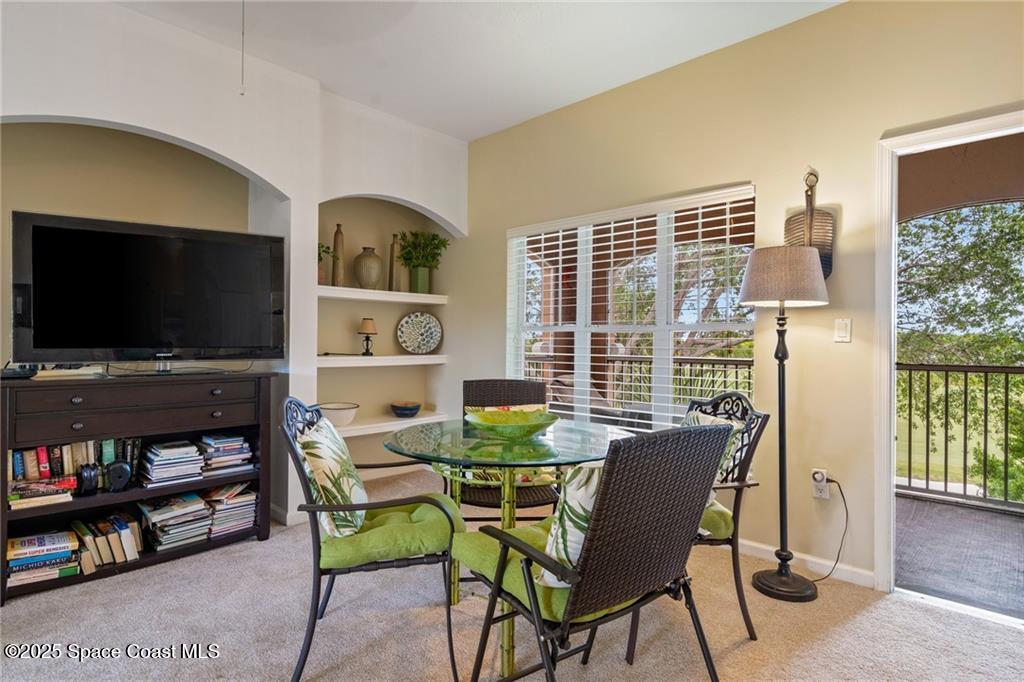 Undisclosed Address Vero Beach, FL 32967 - Photo 9 of 34 a view of a livingroom with furniture and a flat screen tv