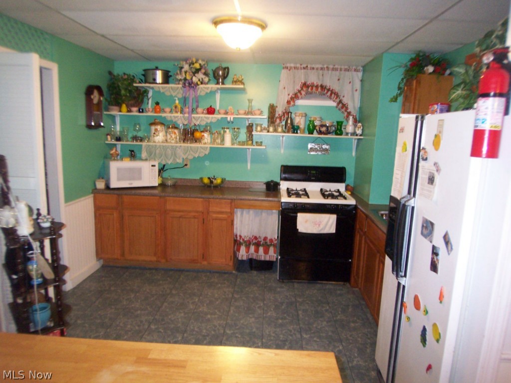 1608 Meister Road Lorain, OH 44053 - Photo 19 of 25 The second kitchen as seen from the finished basement family room.