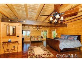 505 Howland Road Asheville, NC 28804 - Photo 15 of 24 a living room with furniture and a flat screen tv
