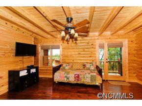505 Howland Road Asheville, NC 28804 - Photo 16 of 24 a living room with furniture and a flat screen tv