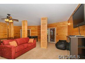 505 Howland Road Asheville, NC 28804 - Photo 22 of 24 a view of living room with furniture and a flat screen tv