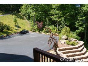 505 Howland Road Asheville, NC 28804 - Photo 23 of 24 a picture of a table and chair in the patio