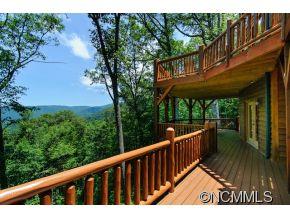 505 Howland Road Asheville, NC 28804 - Photo 4 of 24 a view of a wooden deck with a yard