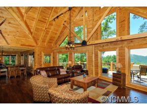 505 Howland Road Asheville, NC 28804 - Photo 7 of 24 a living room with furniture a window and a fireplace