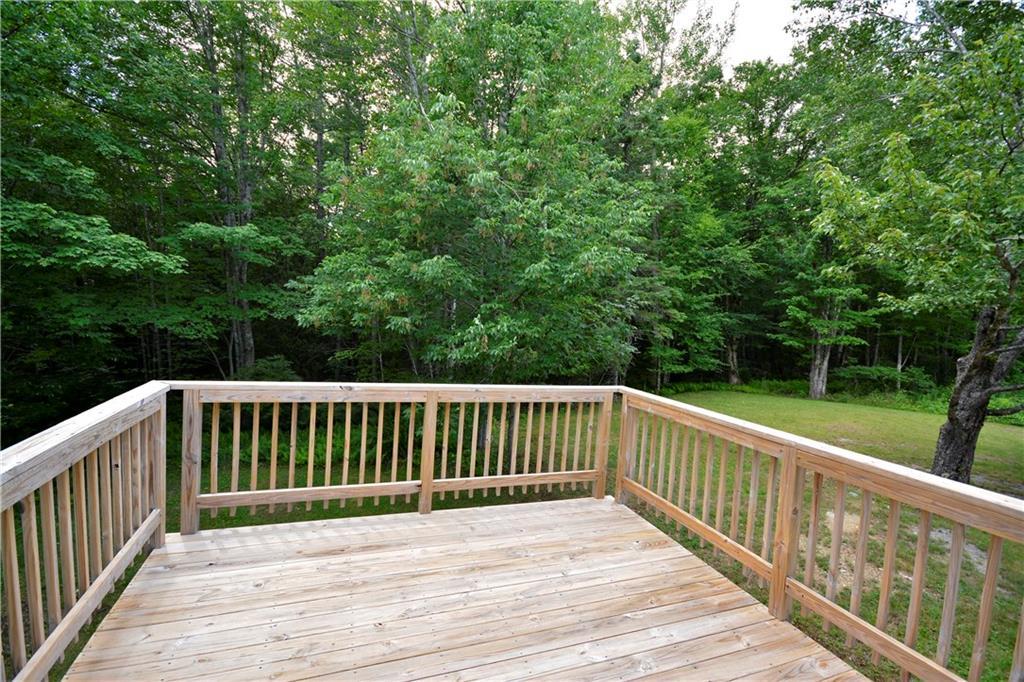 31 Racoon Cove Road Lamoine, ME 04605 - Photo 7 of 21 Looking from the deck towards the...