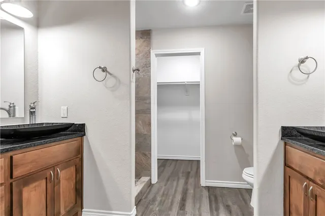 a room that has a toilet and a sink