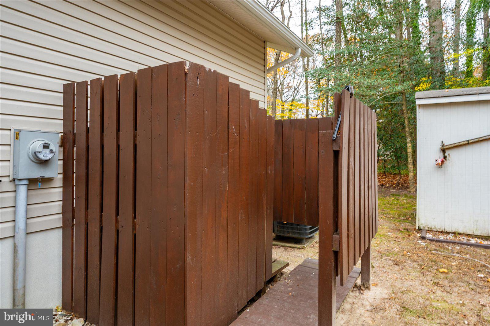 10 Harpoon Road Ocean Pines, MD 21811 - Photo 22 of 44 a view of a house with a wooden fence