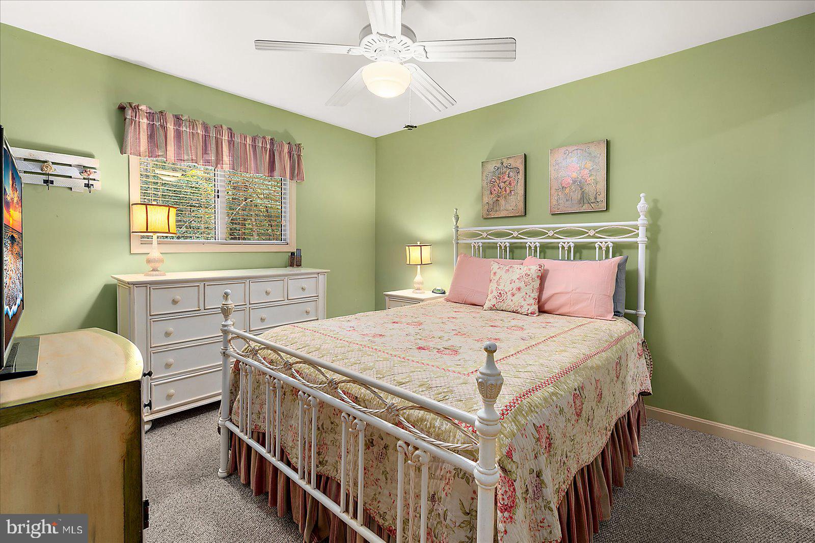 10 Harpoon Road Ocean Pines, MD 21811 - Photo 25 of 44 a bedroom with a bed a dresser and next to a window