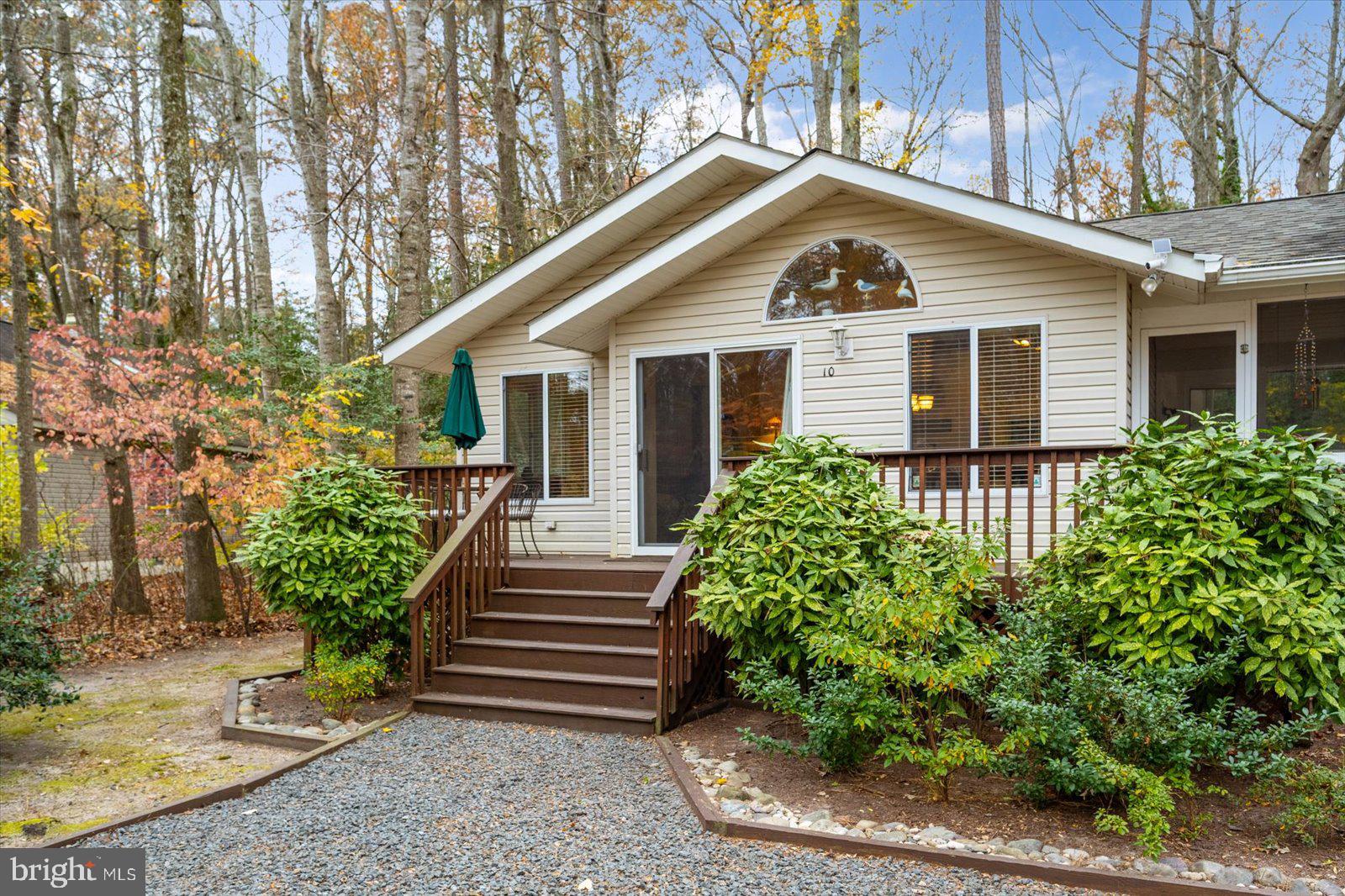 10 Harpoon Road Ocean Pines, MD 21811 - Photo 3 of 44 a front view of house with yard and green space