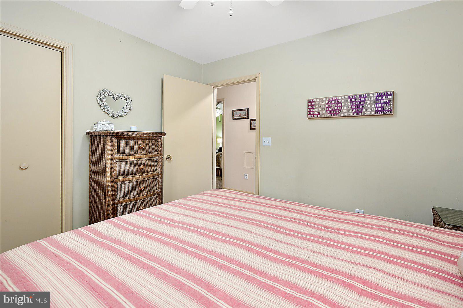 10 Harpoon Road Ocean Pines, MD 21811 - Photo 31 of 44 a bedroom with a bed and a dresser