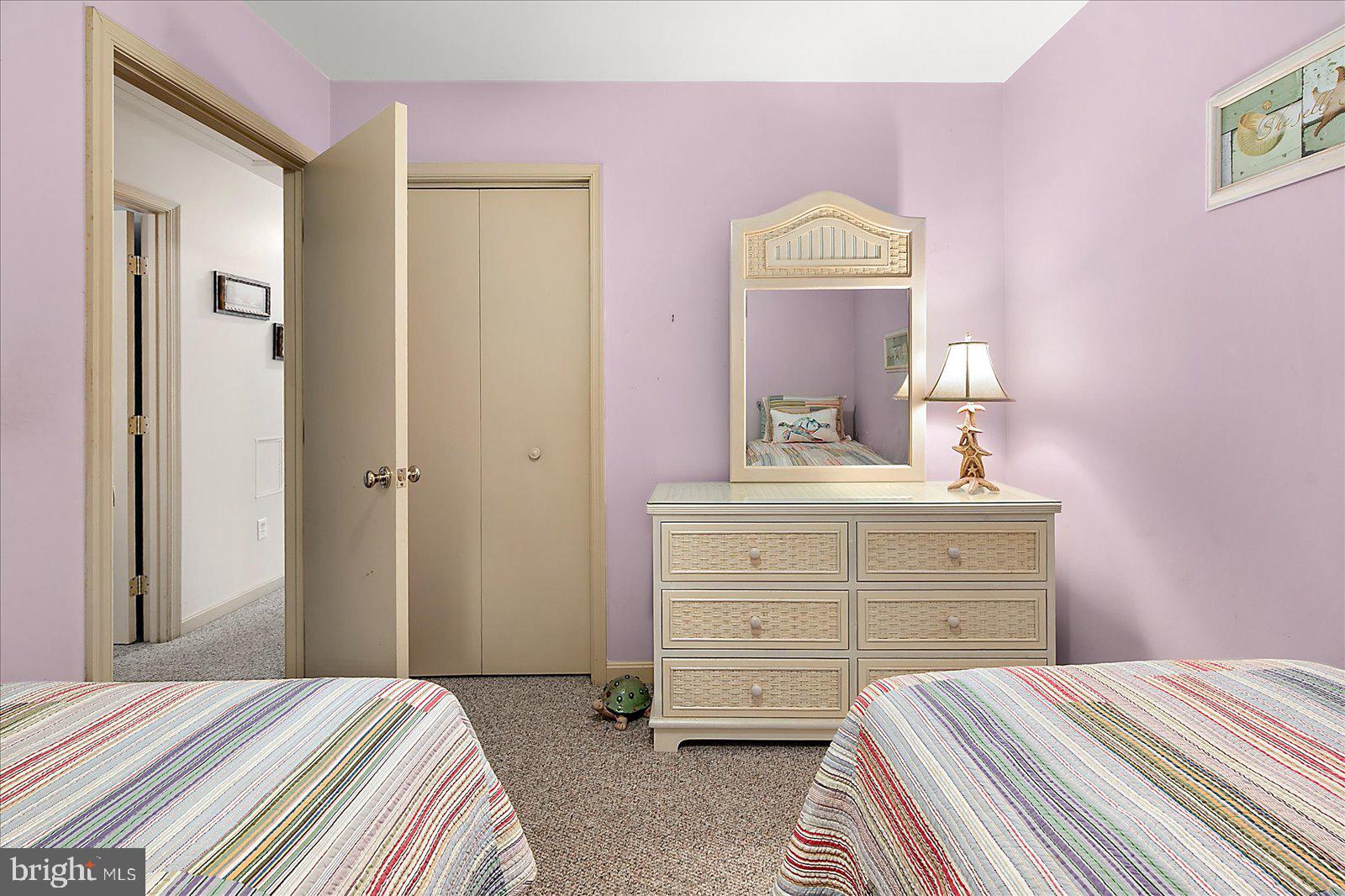 10 Harpoon Road Ocean Pines, MD 21811 - Photo 34 of 44 a bedroom with a bed and a dresser