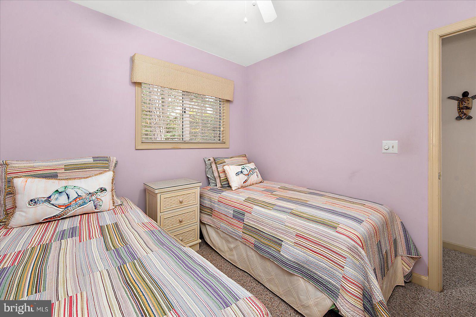 10 Harpoon Road Ocean Pines, MD 21811 - Photo 35 of 44 a bedroom with a bed and wooden floor