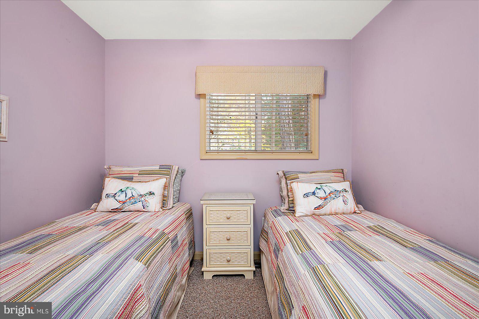 10 Harpoon Road Ocean Pines, MD 21811 - Photo 36 of 44 a bedroom with a bed and a window