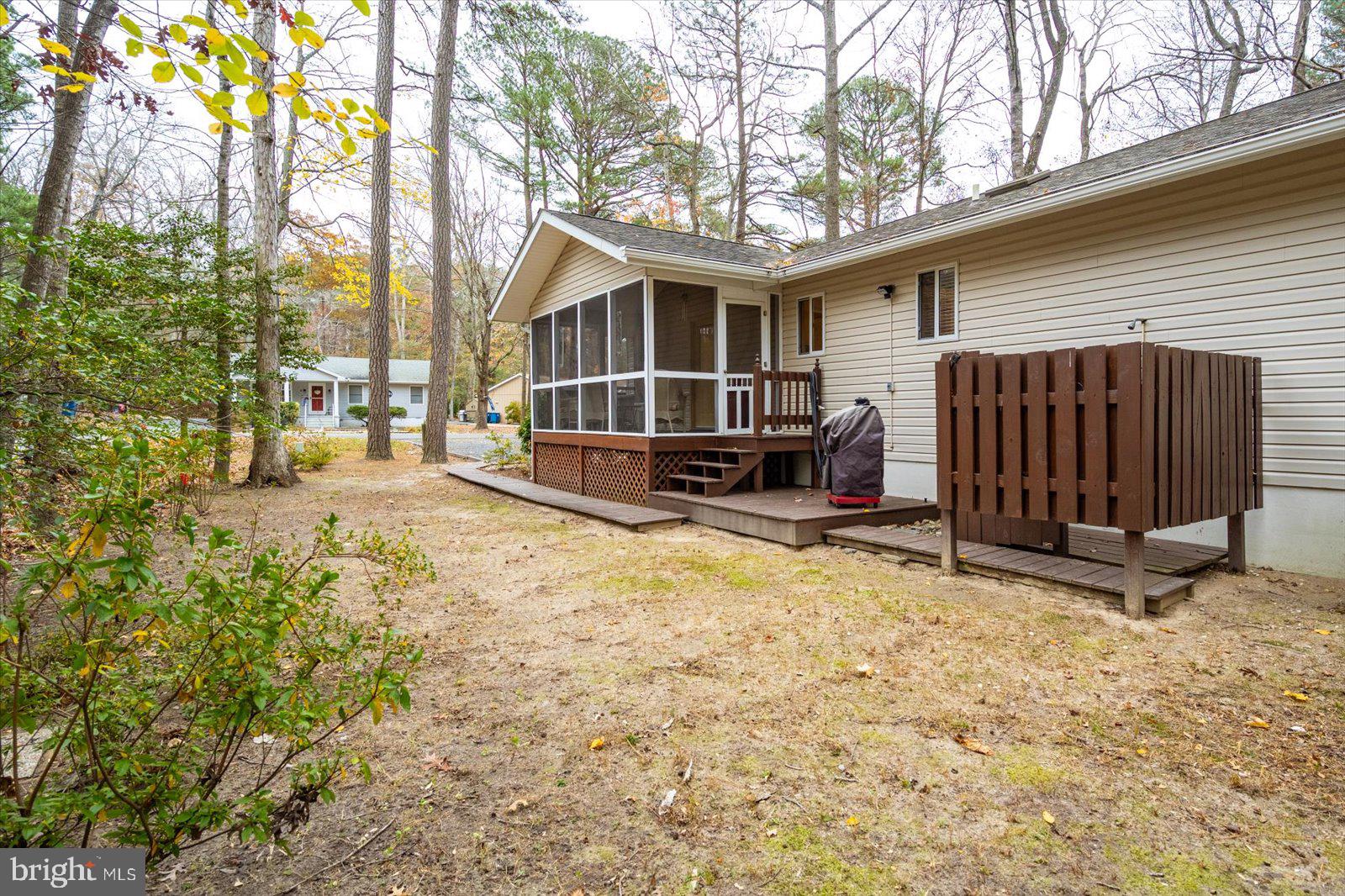 10 Harpoon Road Ocean Pines, MD 21811 - Photo 44 of 44 a view of a house with a yard covered in snow