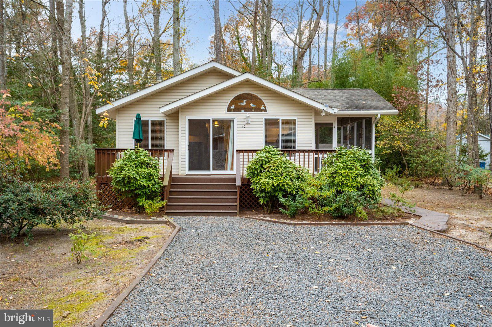 10 Harpoon Road Ocean Pines, MD 21811 - Photo 5 of 44 a front view of a house with a yard