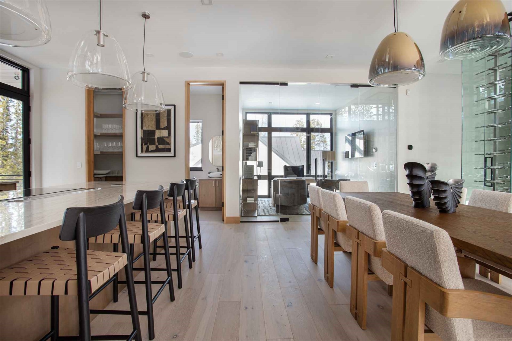 3764 Ski Hill Road Breckenridge, CO 80424 - Photo 18 of 30 a view of a a dining room with furniture window and wooden floor