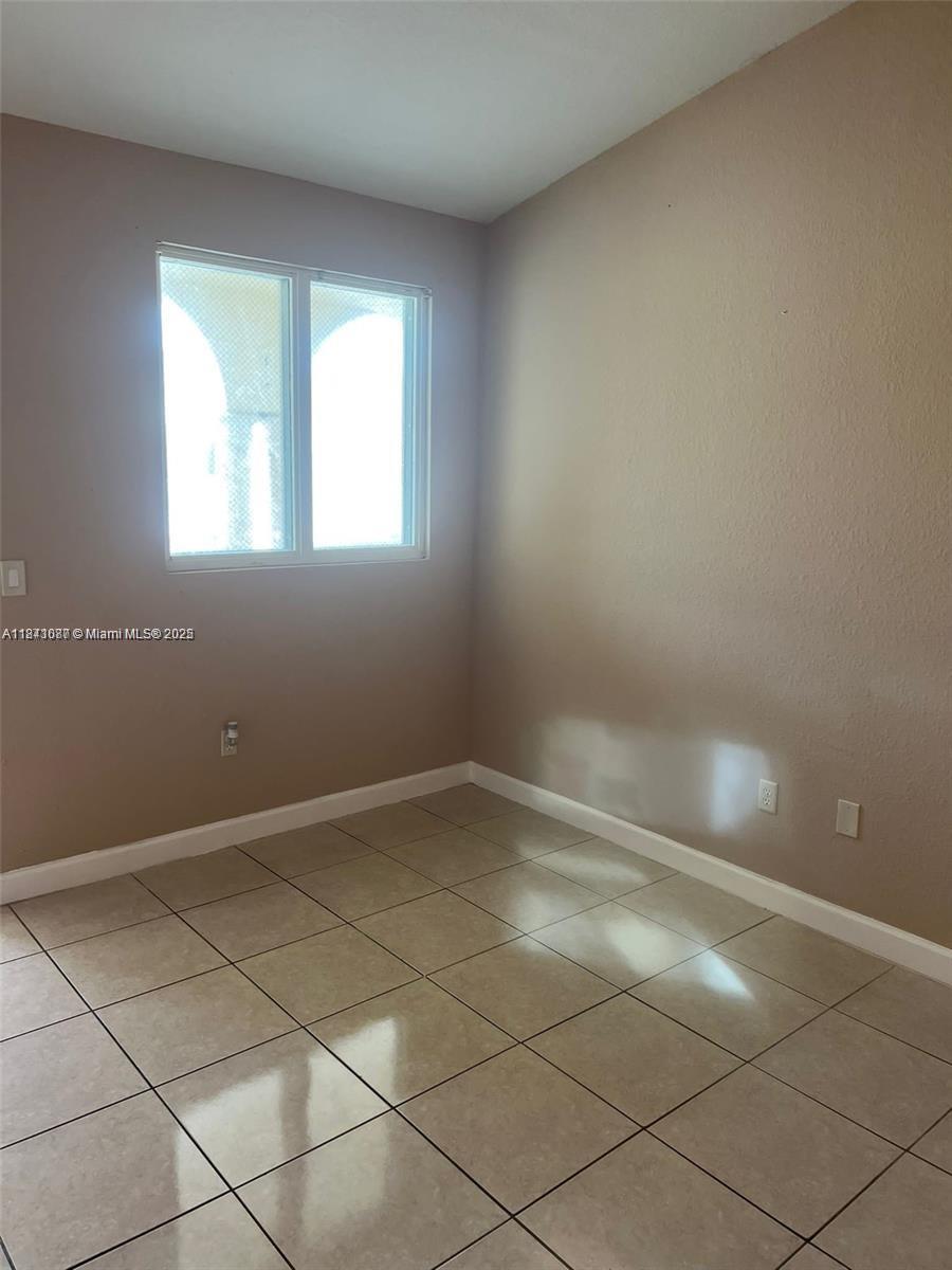 1666 Southeast 27th Court, Unit 208 Homestead, FL 33035 - Photo 6 of 26