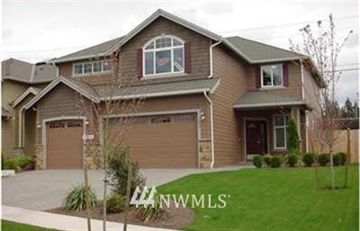 16601 41st Avenue Southeast Bothell, WA 98012 - Photo 1 of 1 a front view of a house with a garden