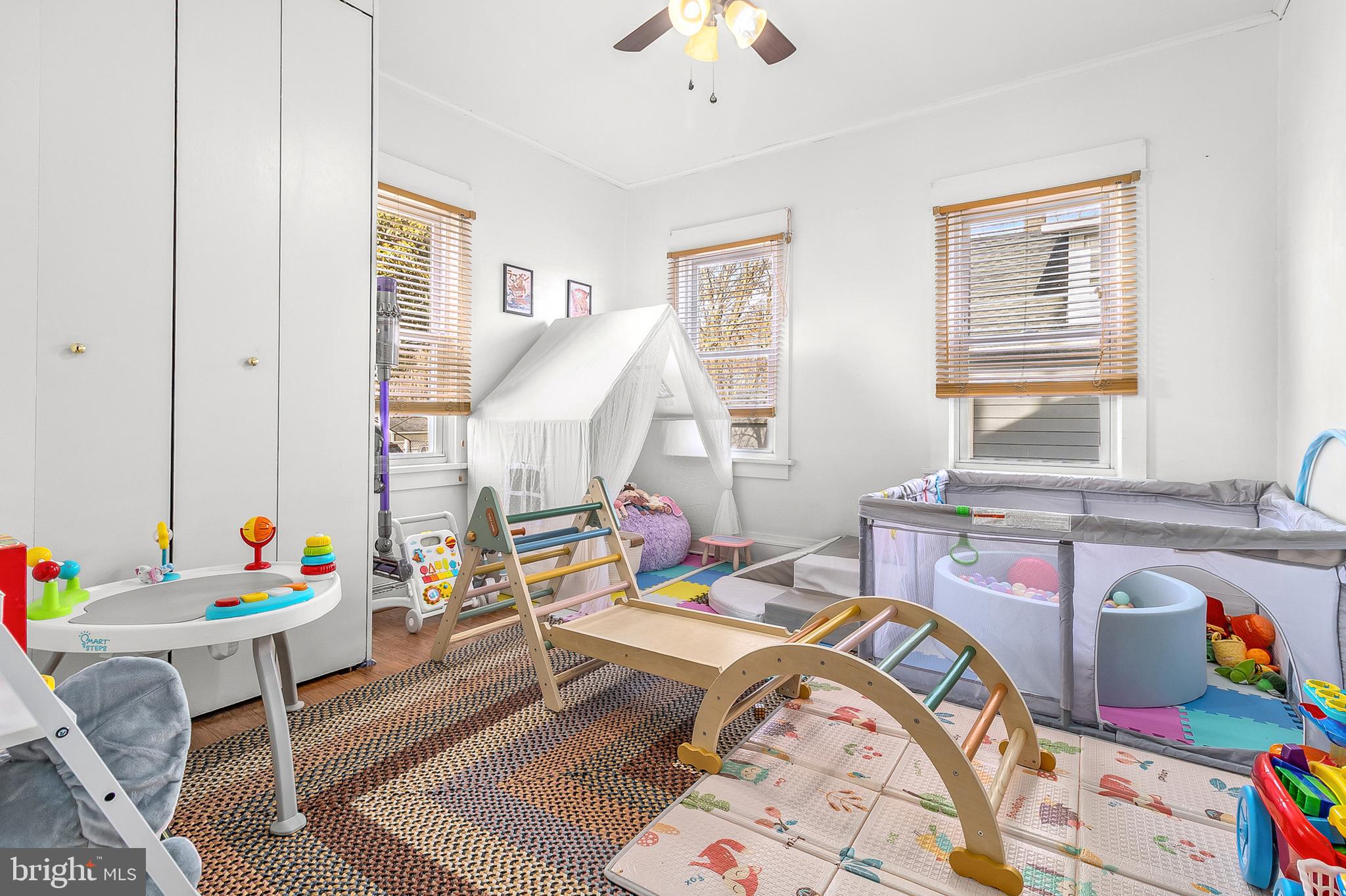 363 Washington Street Mount Holly, NJ 08060 - Photo 13 of 23 a bed room with a bed and windows